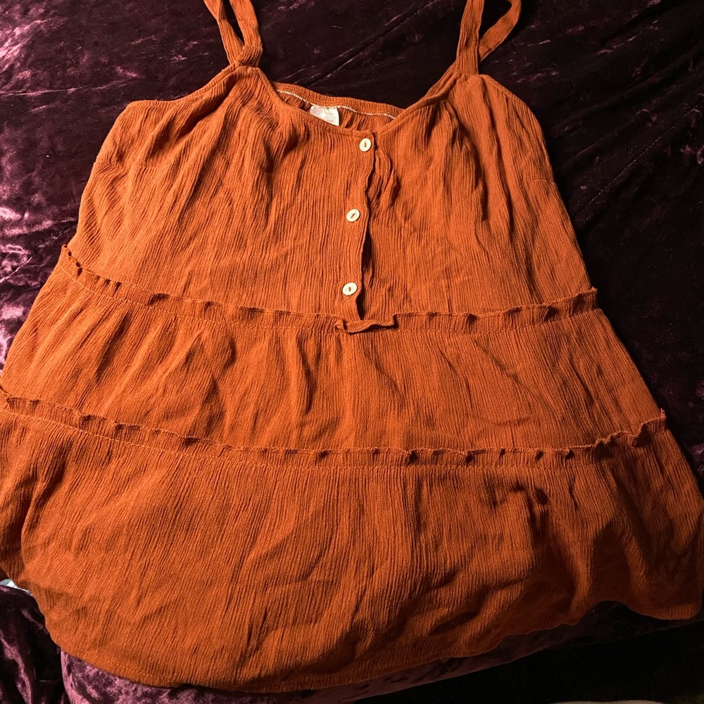 burnt orange tank top perfect for summer.
